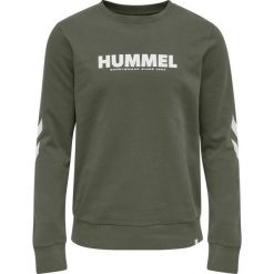 Bluza Hummel hmlLEGACY. Zielone bluzy bez kaptura męskie HUMMEL, bez wzorów, sportowe, bez kołnierzyka, bez ramiączek. Za 191.00 zł.