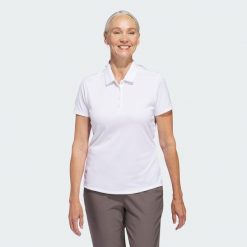 Damska koszulka polo z krótkim rękawem Solid Performance. Białe bluzki damskie Adidas, xl, bez wzorów, klasyczne, bez kołnierzyka, bez ramiączek. Za 229.00 zł.