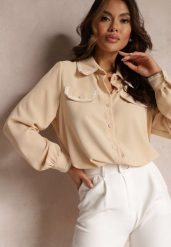 Beżowa Koszula Zdobiona Biżuteryjnymi Guzikami i Tasiemkami Tosur. Brązowe koszule damskie Renee, m, z aplikacjami, eleganckie, bez kołnierzyka, bez ramiączek. Za 119.99 zł.