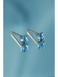 DIAMANTA Złote kolczyki-wkrętki "Single Topazes" z topazem rozmiar: onesize. Niebieskie kolczyki damskie DIAMANTA, z topazem, złote. Za 652.68 zł.