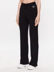 Calvin Klein Jeans Spodnie dresowe J20J222114 Czarny Relaxed Fit. Czarne jeansy damskie Calvin Klein Jeans, m, bez wzorów, z dresówki. Za 469.99 zł.