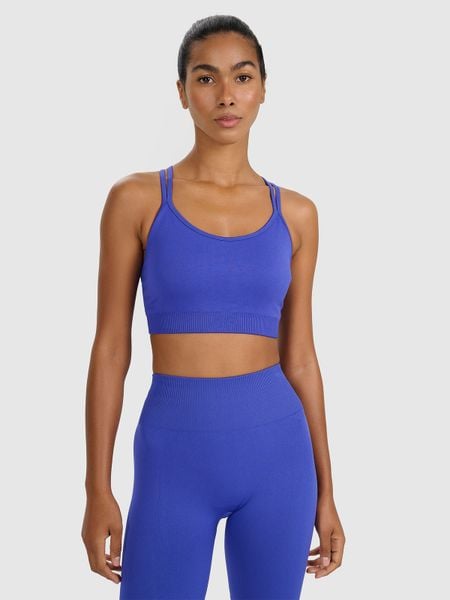 4F Biustonosz treningowy z niskim wsparciem - niebieski XS/S. Niebieskie biustonosze sportowe damskie 4f, bez wzorów, z elastanu. W wyprzedaży za 79.99 zł.