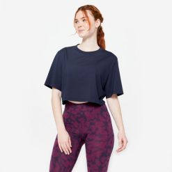 Koszulka damska Domyos Gym & Pilates crop top. Niebieskie bluzki damskie DOMYOS, xs, bez wzorów, z bawełny, bez ramiączek. Za 49.99 zł.