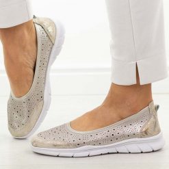 Szampańskie ażurowe skórzane baleriny damskie Jezzi 9997. Żółte baleriny damskie Jezzi, w ażurowe wzory, z jeansu, bez obcasa, na płaskiej podeszwie. Za 189.00 zł.