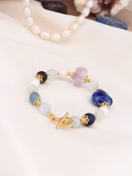 Pierres de Jade Pozłacana bransoletka z ametystami i amazonitami rozmiar: onesize. Białe bransoletki damskie Pierres de Jade, pozłacane. Za 43.99 zł.