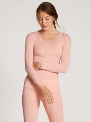 Calida Wełniana koszulka w kolorze koralowym rozmiar: M. Różowe bluzki damskie Calida, m, bez wzorów, z koronki, bez kołnierzyka. Za 178.37 zł.