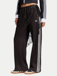 Adidas Spodnie dresowe 2In1 Firebird Loose Track Trousers With Lace Skirt LG4275 Brązowy Relaxed Fit. Brązowe spodnie dresowe damskie Adidas, xs, bez wzorów, z bawełny. Za 369.99 zł.