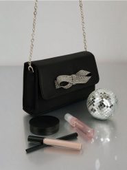 Mała torebka na łańcuszku z kokardą - czarny. Czarne torebki klasyczne damskie Sinsay, bez wzorów, małe, bez dodatków. Za 39.99 zł.