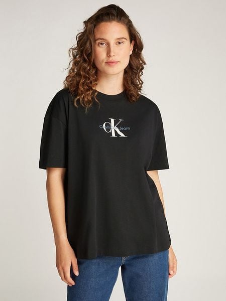 CALVIN KLEIN JEANS Koszulka w kolorze czarnym rozmiar: XS. Czarne bluzki damskie Calvin Klein Jeans, xs, bez wzorów, z bawełny, bez kołnierzyka, bez ramiączek. Za 78.47 zł.
