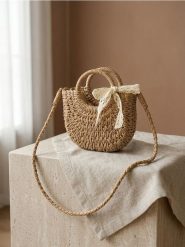 Pleciona torebka z ozdobną kokardą - beżowy. Brązowe torebki klasyczne damskie Sinsay, bez wzorów, bez dodatków. Za 39.99 zł.