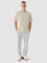 4F T-shirt oversize z nadrukiem męski - beżowy S. Brązowe t-shirty męskie 4f, m, bez wzorów, z bawełny, bez kołnierzyka. W wyprzedaży za 29.99 zł.