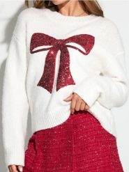 Sweter z cekinową aplikacją w kształcie kokardy i domieszką wełny - kremowy. Białe swetry klasyczne damskie Sinsay, l, z wełny, bez kołnierzyka. Za 69.99 zł.