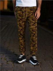 Spodnie jogger - wielobarwny. Spodnie materiałowe męskie Sinsay, bez wzorów, z bawełny. Za 35.99 zł.
