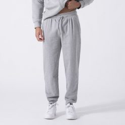 Ikoniczne Spodnie Z Mankiecikiem Siwy Melanz Bawelna, Poliester. Szare spodnie materiałowe męskie Everlast, bez wzorów, z bawełny. Za 199.40 zł.