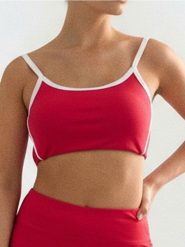 Sportowy top z wyjmowanymi miseczkami Gym Hard - czerwony. Czerwone topy sportowe damskie Sinsay, l, bez wzorów, bez ramiączek. Za 25.99 zł.