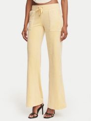 Juicy Couture Spodnie dresowe Layla JCSEBJ001G Żółty Regular Fit. Żółte spodnie dresowe damskie Juicy Couture, m, bez wzorów, z dresówki. Za 379.99 zł.