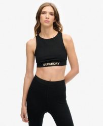 Top sportowy z logo. Brązowe topy sportowe damskie Superdry., bez wzorów, z bawełny, bez ramiączek. Za 199.85 zł.