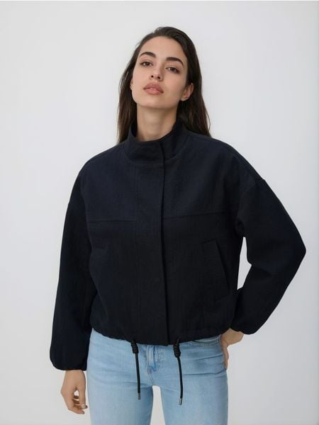 Bawełniana kurtka - czarny. Czarne kurtki damskie Reserved, l, bez wzorów, z bawełny, bez kaptura. Za 159.99 zł.