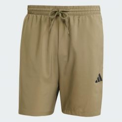 Szorty Essentials 3-Stripes Chelsea. Czarne szorty męskie Adidas, m, z materiału, na fitness i siłownię. Za 105.99 zł.