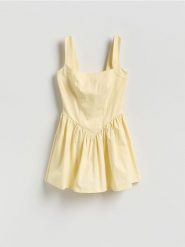 Sukienka mini - jasnożółty. Żółte sukienki damskie Reserved, l, bez wzorów, z dzianiny, bez kołnierzyka, bez ramiączek, mini, rozkloszowane. Za 99.99 zł.