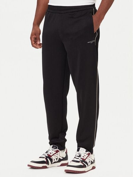Armani Exchange Spodnie dresowe XM001358 AF16278 UC001 Czarny Regular Fit. Czarne spodnie dresowe męskie Armani Exchange, bez wzorów, z bawełny. Za 569.99 zł.
