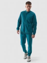 4F Spodnie dresowe joggery męskie - turkusowe M. Niebieskie spodnie dresowe męskie 4f, bez wzorów, z bawełny. W wyprzedaży za 79.99 zł.