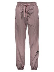 Adidas Spodnie sportowe w kolorze jasnobrązowym rozmiar: L. Brązowe spodnie sportowe damskie Adidas, l, outdoorowe. Za 143.90 zł.