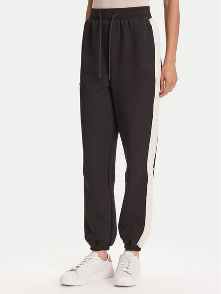 Guess Spodnie dresowe V5YB02 KB3P2 Czarny Regular Fit. Czarne spodnie dresowe damskie Guess, s, z aplikacjami, z dresówki. Za 189.99 zł.