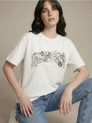 Bawełniana koszulka z napisem i cekinowymi aplikacjami - kremowy. Białe t-shirty damskie Sinsay, l, z aplikacjami, z bawełny, bez kołnierzyka. Za 25.99 zł.