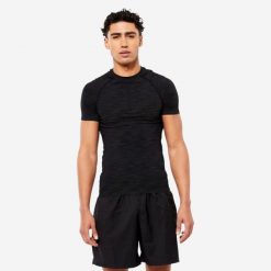 Second Life - Koszulka kompresyjna męska Domyos krótki rękaw - Stan Doskonały. Czarne t-shirty sportowe męskie DOMYOS, l, z elastanu, bez ramiączek, na fitness i siłownię. Za 36.99 zł.