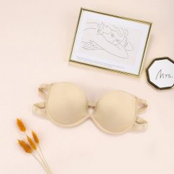 Biustonosz bez ramiączek z delikatnego materiału Indrischka. Brązowe biustonosze Intica, bez wzorów, z materiału. W wyprzedaży za 69.00 zł.