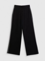 4F Spodnie dresowe z szerokimi nogawkami damskie - czarne L. Czarne spodnie dresowe damskie 4f, l, bez wzorów, z dresówki. Za 159.99 zł.