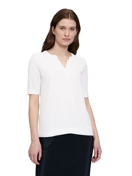 BETTY & CO Koszulka w kolorze białym rozmiar: L. Białe bluzki damskie Betty & Co., l, bez wzorów, bez kołnierzyka. Za 68.95 zł.