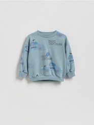 Bluza oversize z nadrukiem - niebieski. Niebieskie bluzy i bluzki niemowlęce Reserved, bez wzorów, z bawełny, bez ramiączek, bez kaptura. Za 39.99 zł.