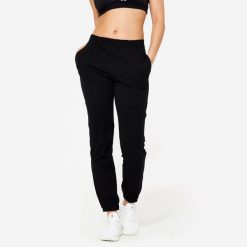 Spodnie damskie Domyos Gym & Pilates 100 regular. Czarne spodnie dresowe damskie DOMYOS, xl, z bawełny, na fitness i siłownię. Za 69.99 zł.