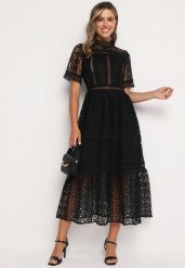 Czarna Maxi Sukienka Rozkloszowana w Ażurowy Wzór z Falbanką Raviletta. Czarne sukienki damskie Born2be, na plażę, na lato, s, w ażurowe wzory, boho, bez kołnierzyka, bez ramiączek, maxi, rozkloszowane. W wyprzedaży za 143.99 zł.