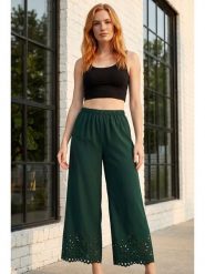 SOULSHAE Spodnie w kolorze zielonym rozmiar: L/XL. Zielone spodnie materiałowe damskie SOULSHAE, bez wzorów, z materiału, z podwyższonym stanem. Za 164.95 zł.