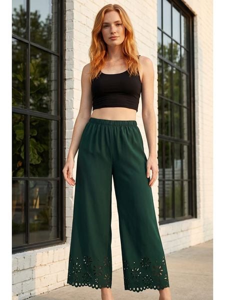 SOULSHAE Spodnie w kolorze zielonym rozmiar: L/XL. Zielone spodnie materiałowe damskie SOULSHAE, bez wzorów, z materiału, z podwyższonym stanem. Za 164.95 zł.