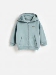 Bluza z bawełną - turkusowy. Niebieskie bluzy i bluzki niemowlęce Reserved, bez wzorów, z bawełny, bez ramiączek, bez kaptura. Za 49.99 zł.