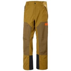 Spodnie narciarskie Helly Hansen Emiko Shell. Brązowe spodnie materiałowe męskie Helly Hansen, bez wzorów, sportowe. Za 927.50 zł.