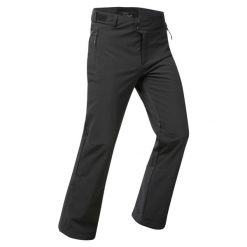 Spodnie narciarskie i snowboardowe męskie Quechua 500 softshell. Czarne spodnie materiałowe męskie WED'ZE, bez wzorów, z materiału, sportowe. Za 279.99 zł.
