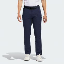 Spodnie Ultimate365 5-pocket. Niebieskie spodnie materiałowe męskie Adidas, bez wzorów, sportowe. Za 369.00 zł.