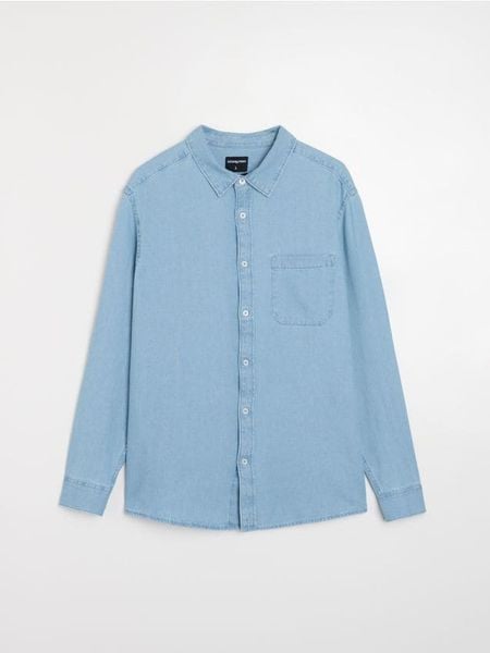 Bawełniana koszula - niebieski. Niebieskie koszule męskie Sinsay, l, bez wzorów, z bawełny, bez kołnierzyka, bez ramiączek. Za 69.99 zł.