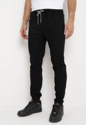 Czarne Jeansy Joggery ze Ściągaczami i Sznurkiem w Pasie Winara. Czarne jeansy męskie Born2be. Za 129.99 zł.