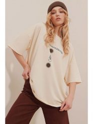 Trend Alacati Koszulka "Trend Alaçat Stili" w kolorze beżowym rozmiar: M. Brązowe bluzki damskie Trend Alacati, m, bez wzorów, z bawełny, bez kołnierzyka. Za 63.95 zł.