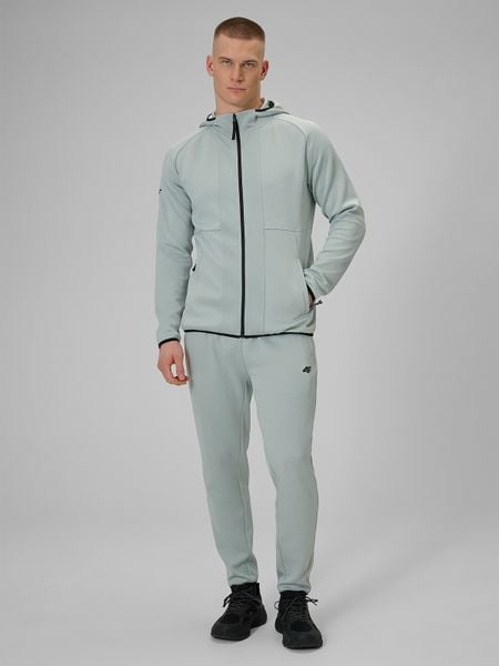 4F Spodnie treningowe szybkoschnące męskie - miętowe M. Niebieskie spodnie materiałowe męskie 4f, bez wzorów, z materiału, biznesowe. Za 199.99 zł.