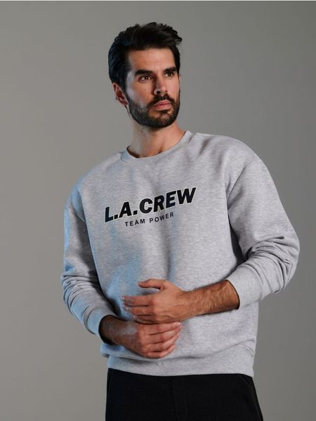 Bluza z napisem - szary. Szare bluzy bez kaptura męskie Sinsay, l. Za 39.99 zł.