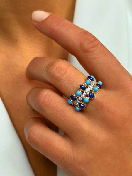 Les Petites Précieuses Pozłacany pierścionek z lapis lazuli rozmiar: 50. Niebieskie pierścionki damskie Les Petites Précieuses, z lazurytem, pozłacane. Za 337.41 zł.