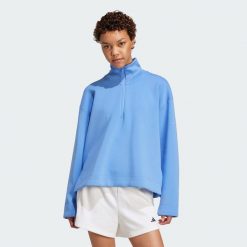 Bluza Soft Lux Quarter-Zip. Niebieskie bluzy bez kaptura damskie Adidas, l. W wyprzedaży za 194.35 zł.