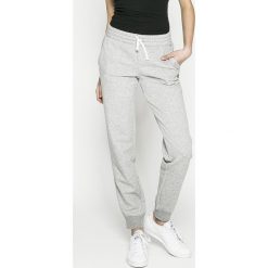 Reebok - Spodnie. Szare spodnie sportowe damskie Reebok, m, z bawełny. W wyprzedaży za 129.90 zł.